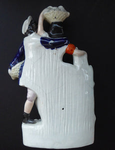 Where is this? ANTIQUE Victorian Staffordshire Flatback Figurine. Rarer Example of a Man and Woman at a Gate Collecting Grapes
