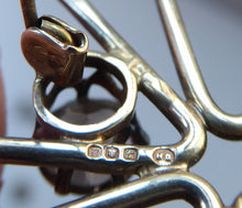 Load image into Gallery viewer, SCOTTISH SILVER 1970s ORTAK Starburst Brooch. Designed by Malcolm Grey.  Set with Three Smoky Quartz Stones. Hallmarked
