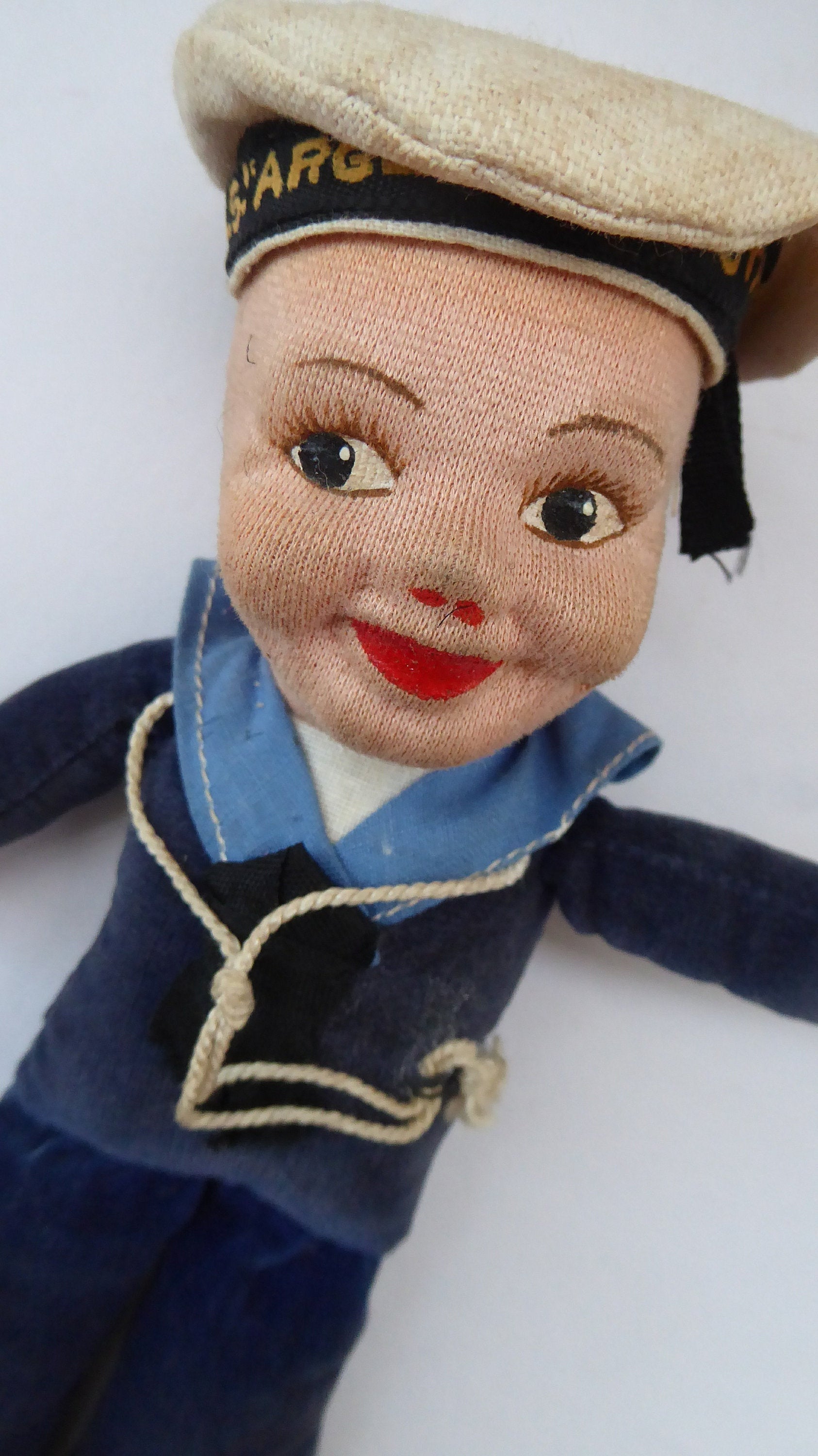 Antique sailor doll top