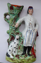 Load image into Gallery viewer, 19th Century Staffordshire Figurine. Rare Antique  Flatback Model / Spill Vase of a Gamekeeper and His Dalmatian Dog
