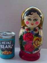 Load image into Gallery viewer, Vintage RUSSIAN Matryoshka Nesting Dolls.  Genuine Russian Set with Original Label Dated 1998. 9 DOLLS in total
