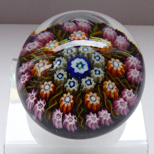 Beautiful VASART Scottish Glass Paperweight with 9 Spokes; with black ground, latticino canes & millefiori