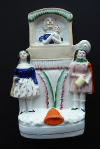STAFFORDSHIRE Figurine. Very Rare Model of a Punch and Judy Show; Judy and her Baby, c 1850s