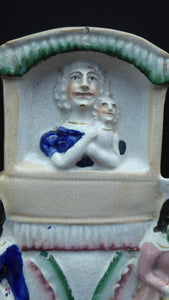 STAFFORDSHIRE Figurine. Very Rare Model of a Punch and Judy Show; Judy and her Baby, c 1850s