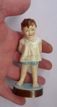 Load image into Gallery viewer, Beautiful 1950s Freda Doughty Royal Worcester Figurine: TOMMY 2913. Issue with brown hair, yellow shirt and blue shorts
