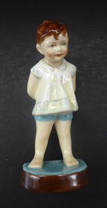 Beautiful 1950s Freda Doughty Royal Worcester Figurine: TOMMY 2913. Issue with brown hair, yellow shirt and blue shorts