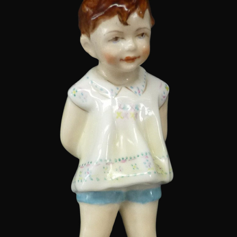 1950s Freda Doughty Royal Worcester Figurine: TOMMY 2913. Issue with brown hair, yellow shirt and blue shorts