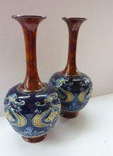 Load image into Gallery viewer, Matching Pair of ROYAL DOULTON LAMBETH Tube Lined Art Nouveau Faience Bottle / Trumpet Vases

