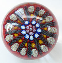 Load image into Gallery viewer, Vintage Scottish Paperweight VASART GLASS. Red Ground with Thirteen Spokes and Millefiori Canes
