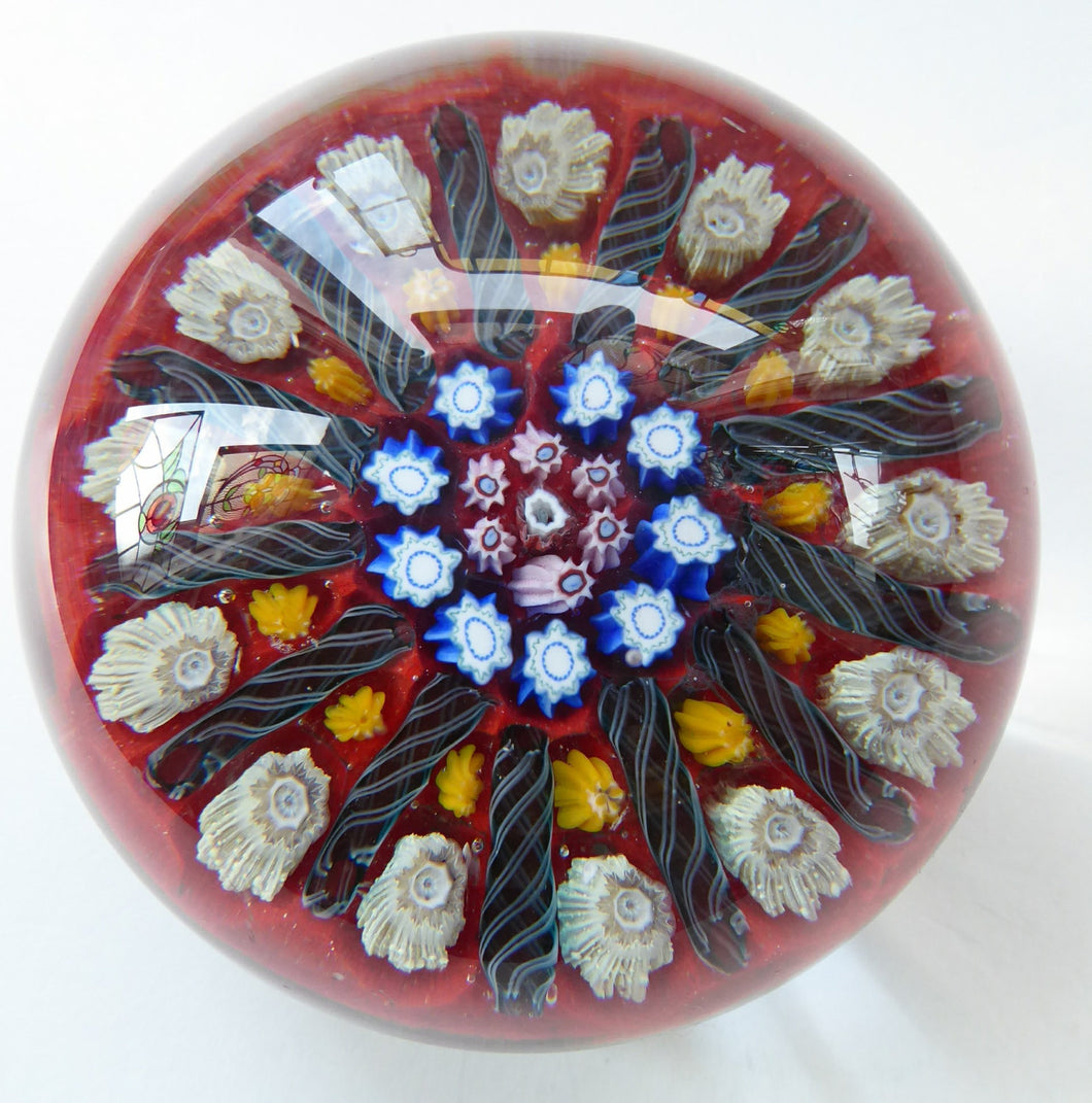 Vintage Scottish Paperweight VASART GLASS. Red Ground with Thirteen Spokes and Millefiori Canes