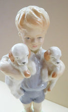 Load image into Gallery viewer, Royal Worcester Figurine MONDAY&#39;S CHILD.  Modelled by Freda Doughty. No 3519. Boy Holding Puppies. PRISTINE
