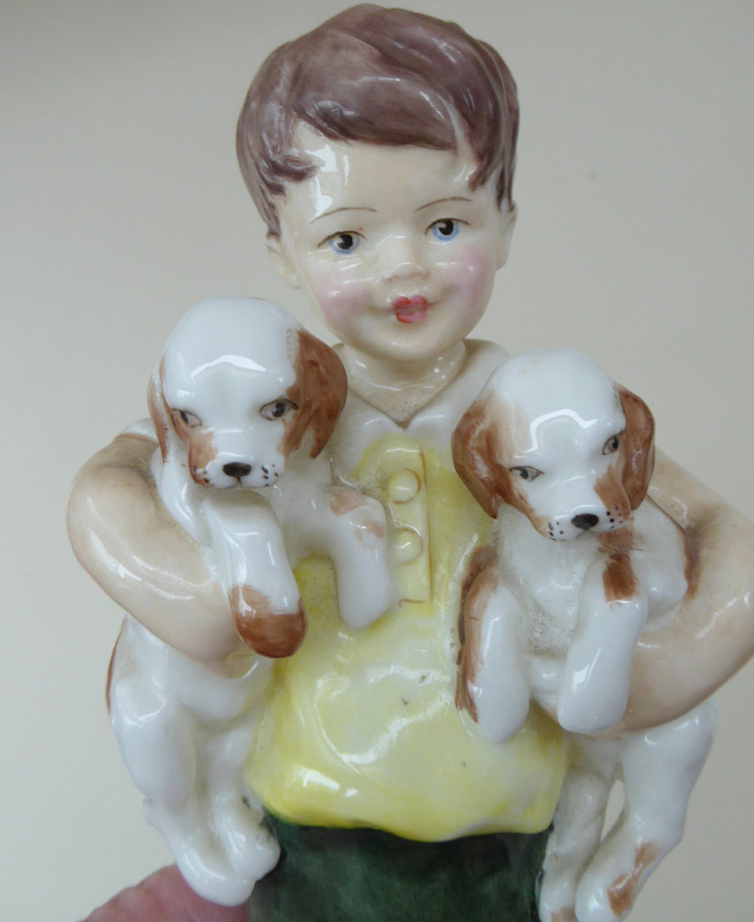 Royal Worcester Figurine. ALL MINE.  Modelled by Freda Doughty. No 3519. Boy Holding Puppies. PRISTINE