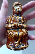 Load image into Gallery viewer, Antique 19th Century Treacle Glazed SCOTTISH POTTERY Money Box or Bank in the Form of a Seated Gentleman
