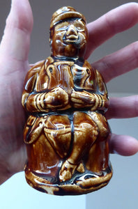 Antique 19th Century Treacle Glazed SCOTTISH POTTERY Money Box or Bank in the Form of a Seated Gentleman